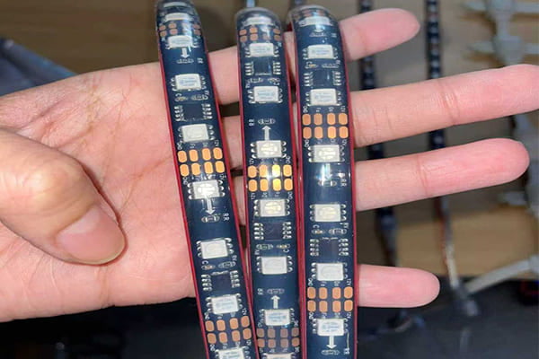 Close-up of a 12V LED strip light showing its short cut marks.